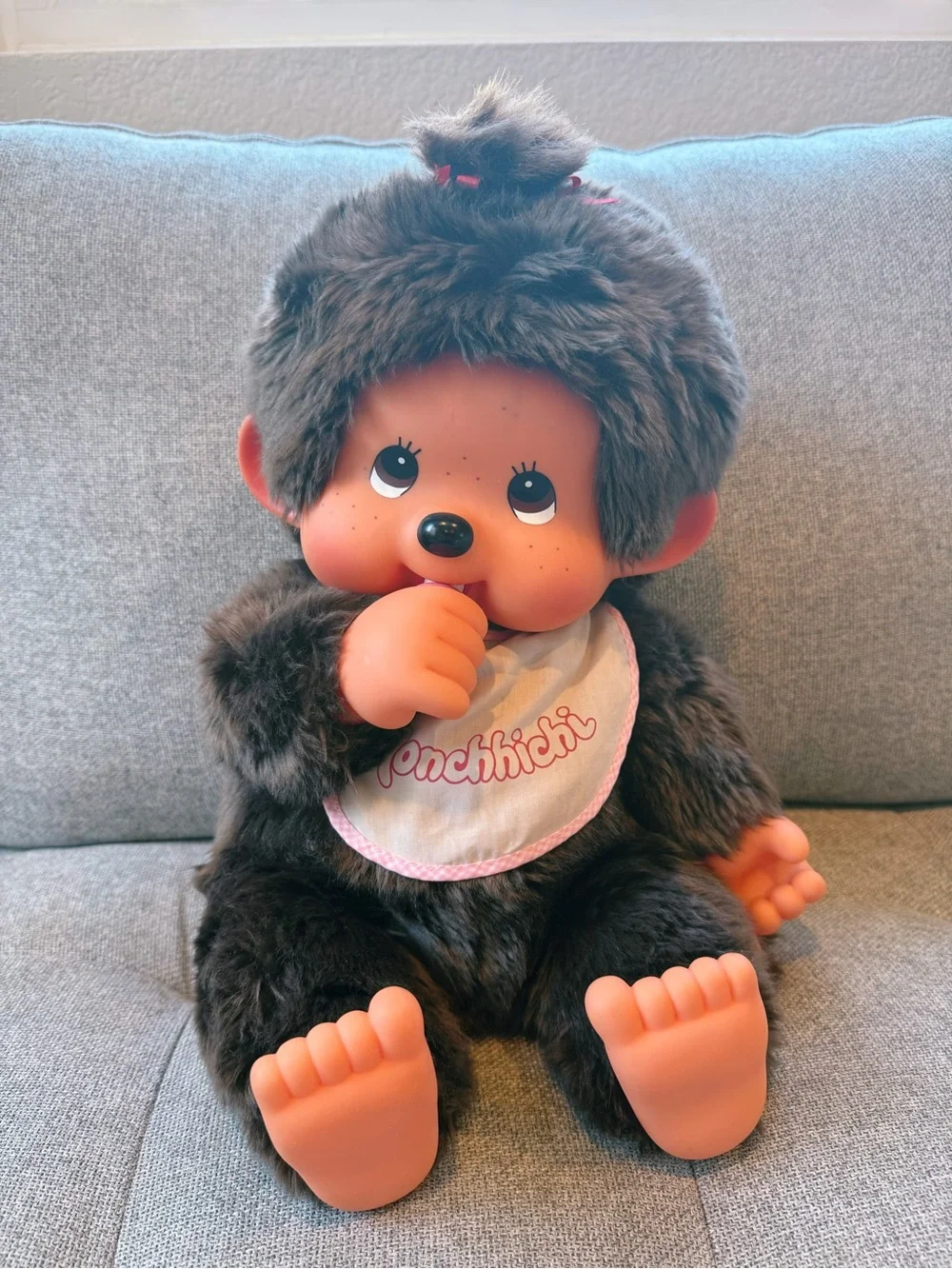Large vintage Monchhichi girl doll in sitting position